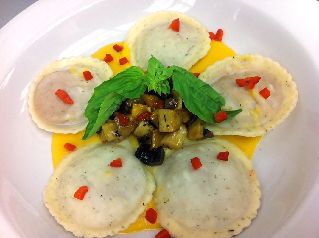 Cucina della Cucina Duck Confit with Balsamic Glazed Apples Ravioli